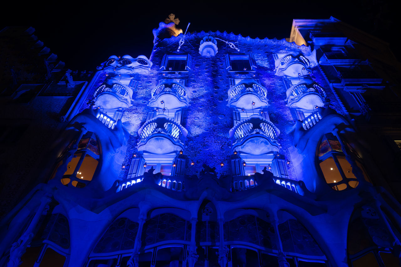 architecture, night, built structure, building exterior, illuminated, low angle view, blue, light, no people, travel destinations, building, city, religion