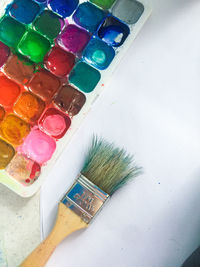 High angle view of paintbrushes on table