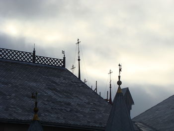 Low angle view of roof of building against sky