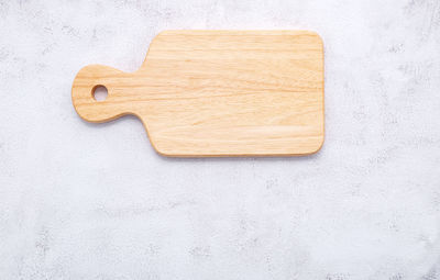 High angle view of bread on white table