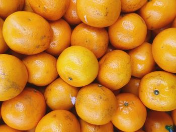 Full frame shot of oranges in market