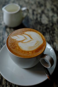 Close-up of coffee served on table