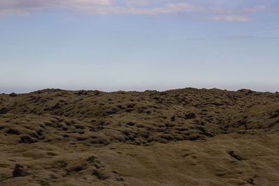 Scenic view of desert against sky