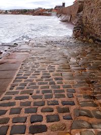 Surface level of footpath by sea