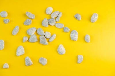 Full frame shot of multi colored pencils on yellow background