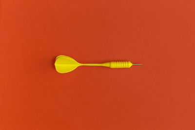 Directly above shot of sunglasses against yellow background