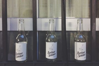 Close-up of bottles on shelf