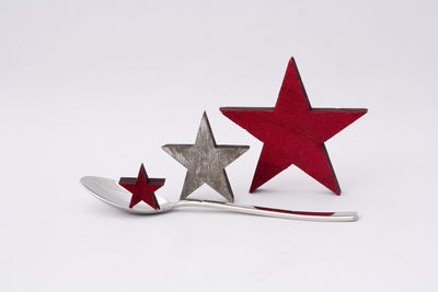 High angle view of red umbrella on white background