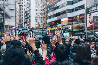 Group of people on street in city