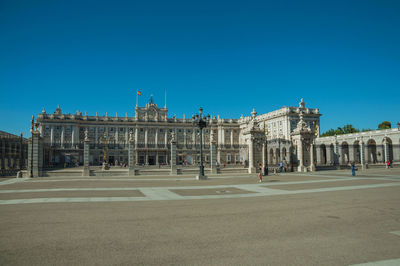 Facade of historic building against blue sky