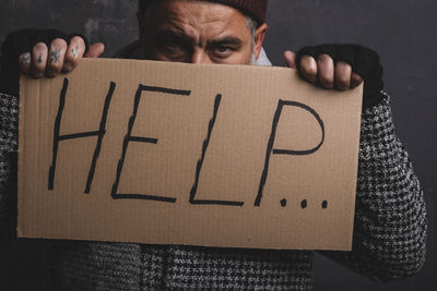 Homeless man asking for help for hunger