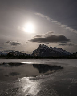 Moonlight over vermillion lakes and rundle