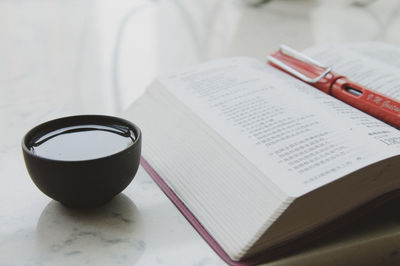 Close-up of open book on table