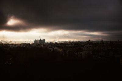 High angle view of buildings against sky during sunset