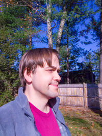 Portrait of teenage boy looking away