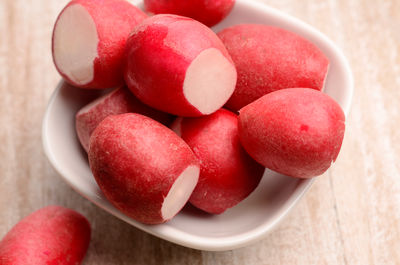 High angle view of strawberries in bowl on table