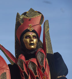 Low angle view of statue against sky