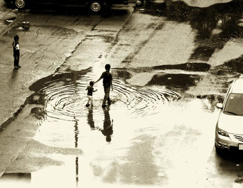 Reflection of woman in water