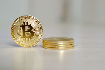 Close-up of coins on table