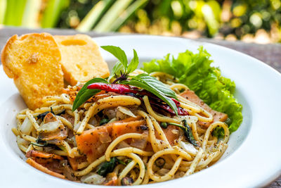 Close-up of noodles served in plate on table