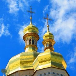 Low angle view of church against blue sky