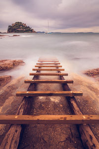 Scenic view of sea against sky at sunset