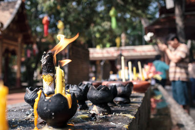 Burning candles in buddhist temple