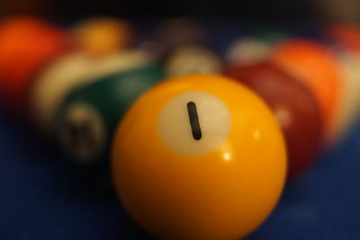 Close-up of yellow ball on table