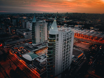 High angle view of city buildings during sunset