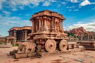 View of temple against cloudy sky