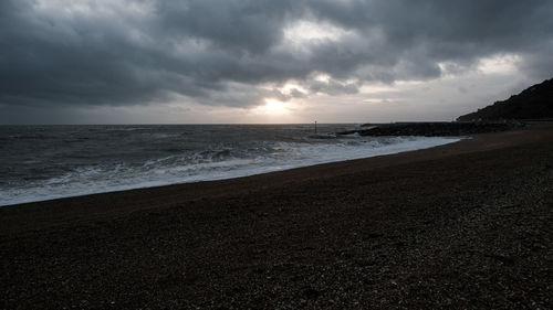 Scenic view of beach against sky