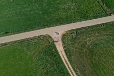 High angle view of road amidst field
