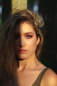 Close-up portrait of young woman with make-up