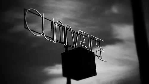 Low angle view of lamp post against sky