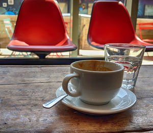 Coffee cup on table in cafe