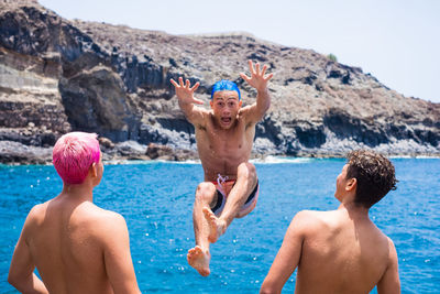 People enjoying in swimming pool