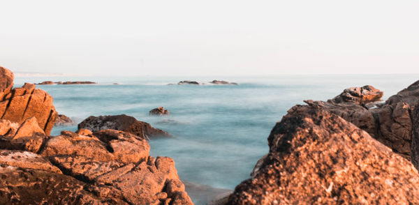 Panoramic view of sea against clear sky