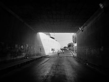 Road amidst buildings in city