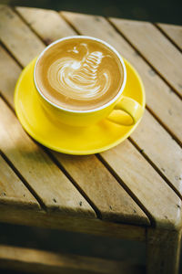 High angle view of cappuccino on table