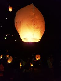 Low angle view of illuminated light bulb