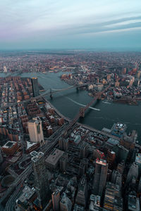 High angle view of buildings in city against sky