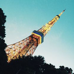 Low angle view of tower against clear blue sky