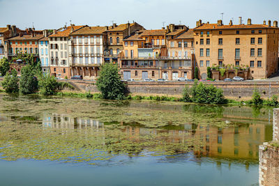 Reflection of buildings in lake