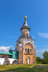 View of historic building against clear blue sky