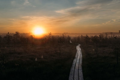 Scenic view of landscape against sky during sunset