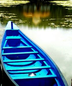 Boats in calm lake