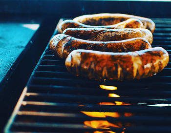 Close-up of meat on barbecue grill