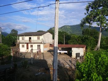 Houses and buildings against sky