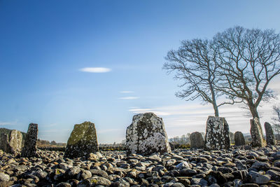 Stack of pebbles against sky