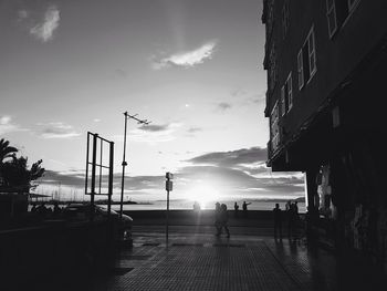 Panoramic view of silhouette city against sky